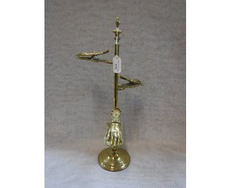 A VICTORIAN BRASS THREE-TIER DESK LETTER CLIP, three sprung hands mounted on a pole