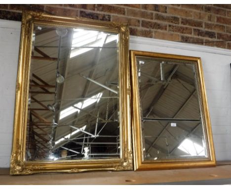 A PERIOD STYLE GILT FRAMED MIRROR, 74 cms x 105 cms and another, 63 cms x 89 cms and a tapestry fire screen