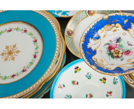 COLLECTION OF VICTORIAN MINTONS PLATES AND SAUCERS
comprising a plate with a hand-painted landscape scene on a white ground, 