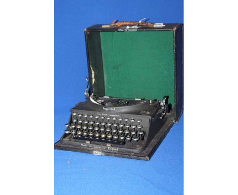 IMPERIAL GOOD COMPANION PORTABLE TYPEWRITER
in black leather box, 31cm long 