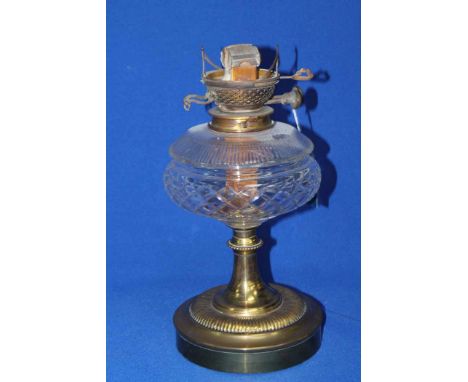 VICTORIAN BRASS OIL LAMP WITH CLEAR GLASS RESERVOIR 
also a box of violin chin rests, bridges and tuning tool