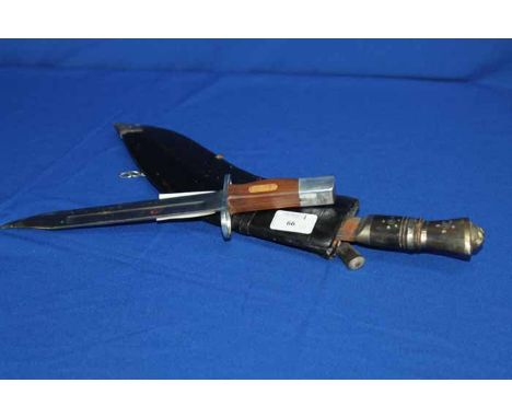 EARLY 20TH CENTURY KUKRI
steel blade, horn handle, with scabbard, 37.5cm long; together with a 20th century dagger (2)