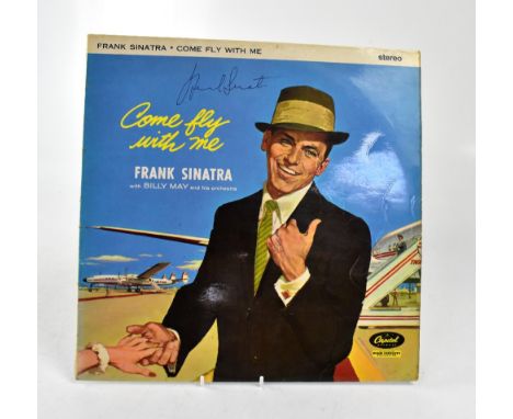 FRANK SINATRA; 'Come Fly with Me', an album bearing the megastar's signature to the front cover.We have not authenticated thi