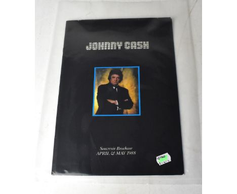 JOHNNY CASH; a 1988 tour programme bearing the star's signature and that of June Carter Cash.We have not authenticated these 