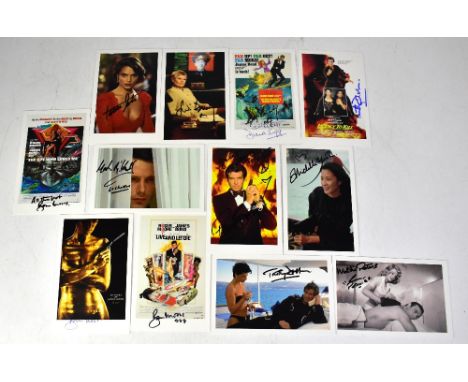 JAMES BOND; a collection of promotional 007 cards bearing signatures, to include Roger Moore (x3), Diana Rigg, Timothy Dalton