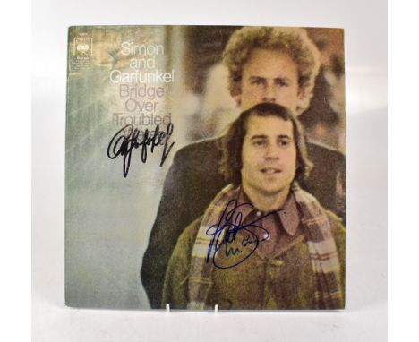 SIMON & GARFUNKEL; 'Bridge Over Troubled Water', an album bearing the signatures of both stars to the cover.We have not authe