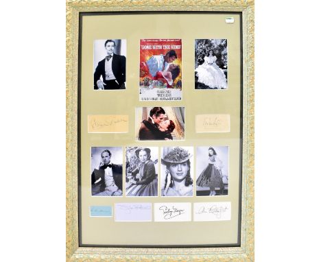 GONE WITH THE WIND; a framed montage of photographs and original film slip, bearing signatures including Clark Gable, Olivia 