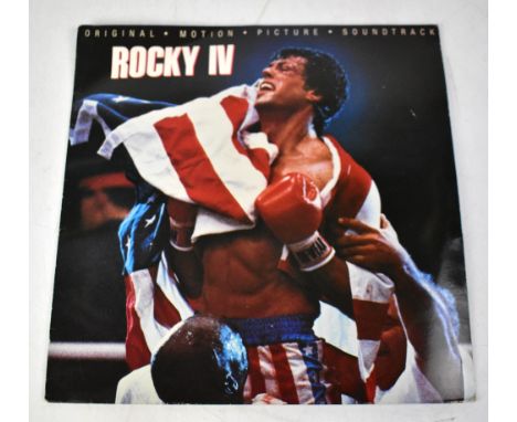 ROCKY; a Rocky IV soundtrack bearing the signatures of Sylvester Stallone and Carol Weathers verso.We have not authenticated 