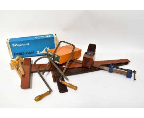 A quantity of vintage tools, to include a wooden plane, various wooden mallets, chisels, a boxed Record plane, vintage wooden