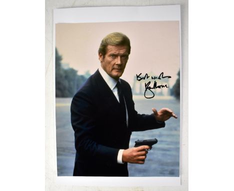 ROGER MOORE; a colour photograph bearing his signature, 25 x 22.5cm.We have not authenticated this signature, please satisfy 