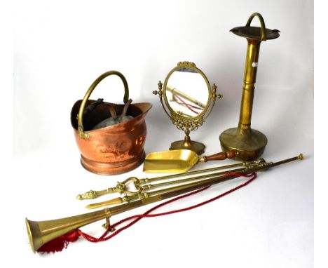 A quantity of brass and copper ware to include a swing dressing table mirror, various fire irons, candlesticks, ashtray, coal