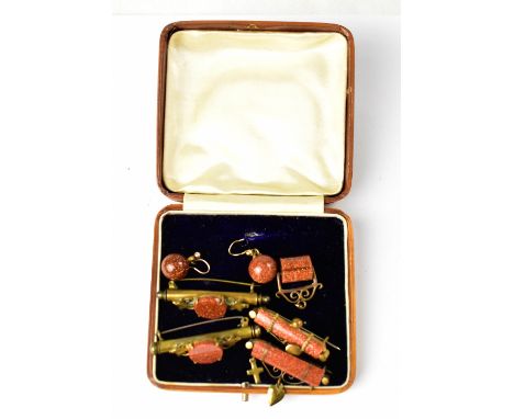 Four early 20th century yellow metal bar brooches, each set with Chinese goldstone, a scroll design pendant and a pair of dro
