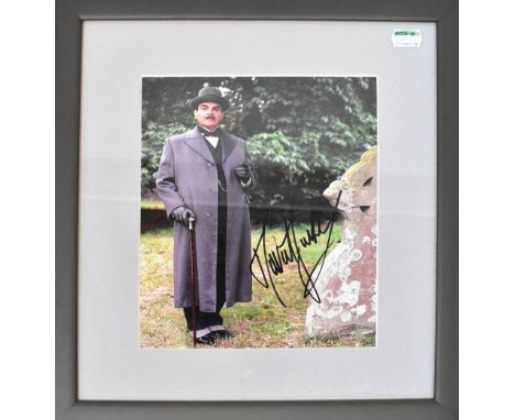 DAVID SUCHET; a colour photograph of the actor, bearing his signature, 25 x 19cm, framed and glazed, with certificate of auth