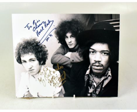 THE EXPERIENCE; a black and white photograph bearing the signatures of Noel Redding and Mitch Mitchell.We have not authentica