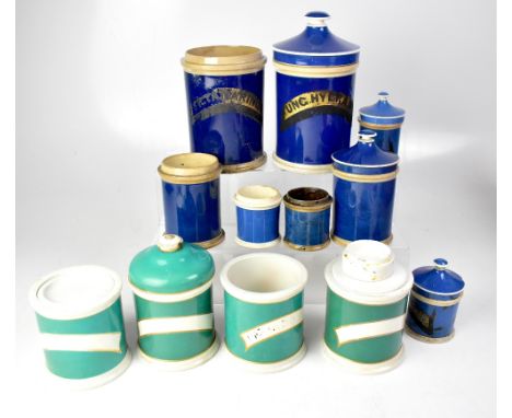 PHARMACEUTICAL INTEREST; a group of early 20th century pharmaceutical ceramic jars, including green and blue examples, some w