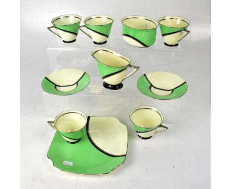 ROYAL DOULTON; a quantity of Art Deco tea ware in the 'De Luxe' pattern, in green, black, silver and cream Art Deco palette, 