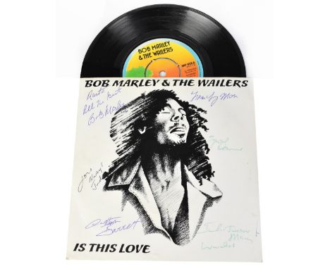 BOB MARLEY & THE WAILERS; a 45rpm single, 'Is This Love?', bearing the signatures of Bob Marley and members of the Wailers to