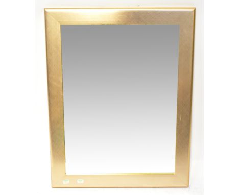 A contemporary gilt framed wall mirror with bevel edge plate and hatched decoration to the frame, 72 x 57cm.