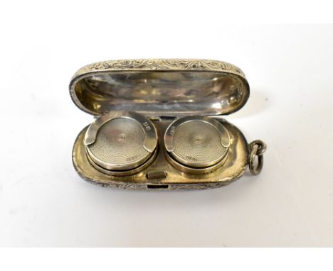 A hallmarked silver full sovereign and half sovereign case of lozenge shape, with engine turned decoration and blank cartouch