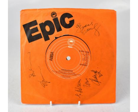 ABBA; a single 'Chiquitita/Love Light', bearing the signatures of the four band members to the orange sleeve.We have not auth
