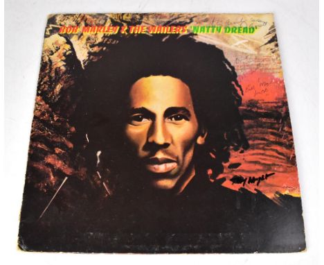 BOB MARLEY & THE WAILERS; 'Natty Dread' LP, bearing the signatures of Bob Marley and members of the Wailers.We have not authe