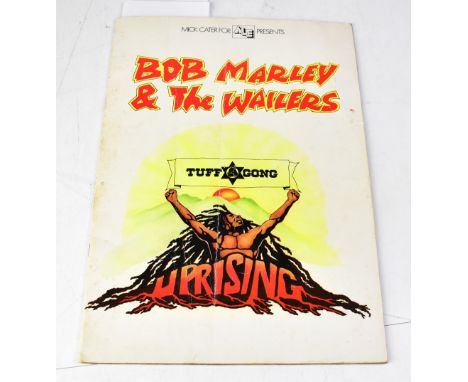 BOB MARLEY & THE WAILERS; an Uprising programme, bearing the signatures of Bob Marley and The Wailers to the centre page, als