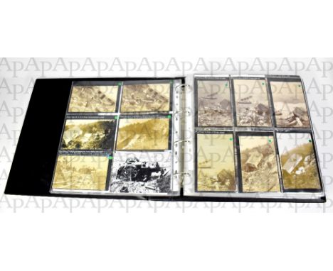 POSTCARD ALBUM; an album of vintage postcards and photographic images, mostly steam orientated, with ploughs and steam accide