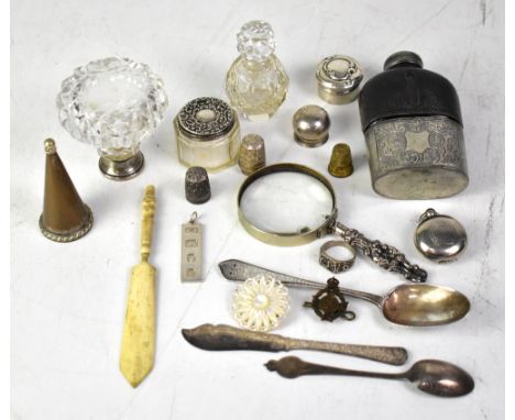 A mixed lot of silver plated wares and other items, to include a silver-handled magnifying glass, a silver ingot on a pendant