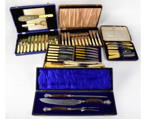 A quantity of cased flatware to include a James Deakin &amp; Sons antler-handled carving set with hallmarked silver pommels a