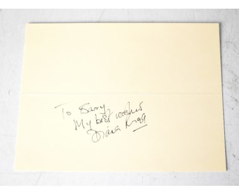 DIANA RIGG; a card bearing her signature.We have not authenticated this signature, please satisfy yourself as to the veracity