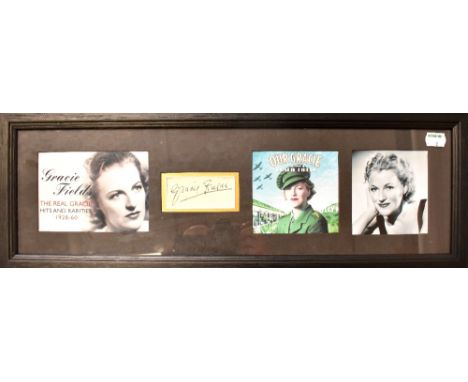 A black and white photograph of Virginia Mayo with an autograph album page slip bearing the star's signature beneath, 39 x 29