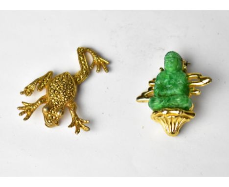 A yellow metal brooch with jade figure in the Oriental style, marked verso '9980' and a yellow metal brooch in the form of a 