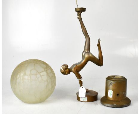 An Art Deco style gilded table lamp modelled as a nude female, with crackle-effect globular shade, height 54cm. CONDITION REP