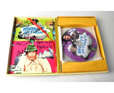 MONTY PYTHON'S FLYING CIRCUS; a Japanese DVD bearing several signatures, to include Terry Jones, Michael Palin, etc. We have 