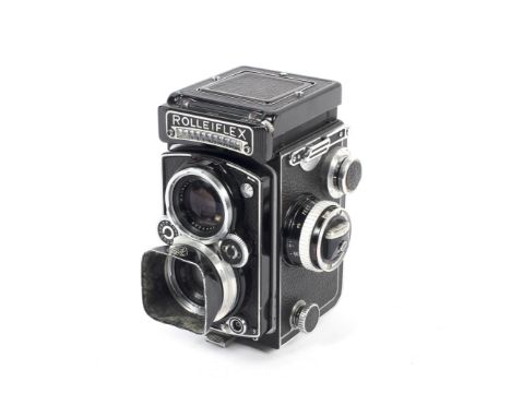 A Rolleiflex 3.5E DBP 1761173 DBGM 6x6 medium format TLR camera. With a Carl Zeiss 75mm 1:3.5 Planar lens and lens hood Condi