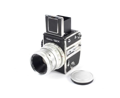 A Kowa SIX 6x6 medium format SLR camera. With a Kowa 85mm 1:2.8 lens Condition Report: Shutter: Fires but is sticking at spee