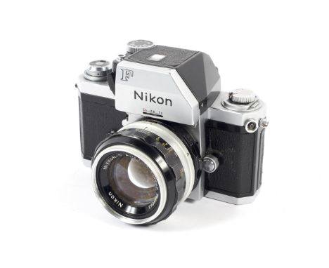 A silver Nikon F 35mm SLR camera. With Photomic FTN finder and 50mm 1:1.4 Nikkor-S lens