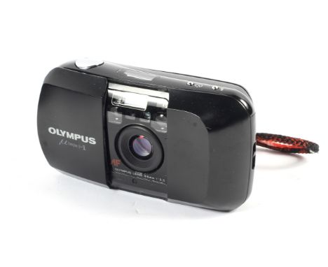 An Olympus MJU I 35mm point and shoot camera. Wth a 35mm 1:3.5 lens Condition Report: Unable to test camera functions without