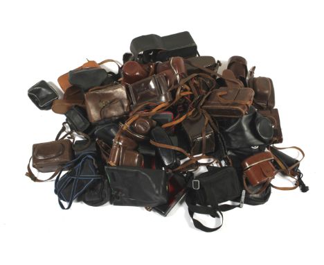 A collection of camera cases. To include makers such as Leitz, Voigtlander, Canon, Fuji, Ensign, and more