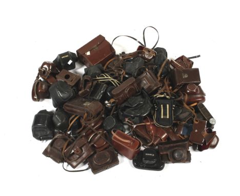 A collection of camera cases. To include makers such as Leica, Zeiss, Canon, Mamiya, Microcord and more
