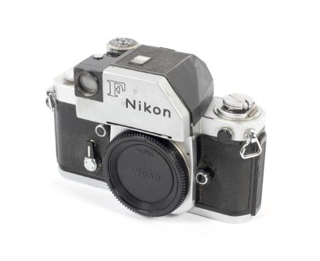 A silver Nikon F2 35mm SLR camera body with a Photomic prism finder.