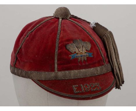 G Bevan red Schoolboys Wales v. England rugby union cap, 1923, red velvet cap with silver tassel and braiding embroidered E. 