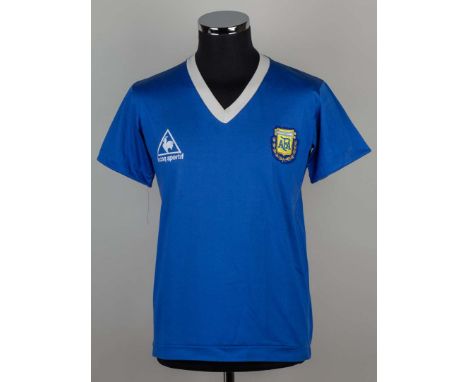 Oscar Ruggeri blue and white No.19 Argentina v. Uruguay short-sleeved shirt, 1986, Le Coq Sportif, L, with v-neck collar and 