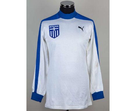 Mike Duxbury Nikos Anastopoulos white and blue No.9 Greece v. England match worn long-sleeved shirt, 1983, Puma, with crew-ne