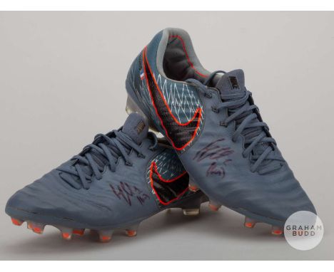 A pair of Hugo Lloris grey Nike Tiempo football boots, size 9 with Lloris and French flag decals to both boots and signed in 