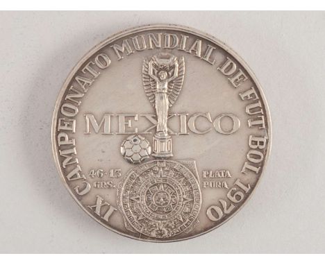 A white-metal 1970 World Cup participation medal, inscribed El Futbol Lazo De Amistad Entre Las Naciones", 45mm