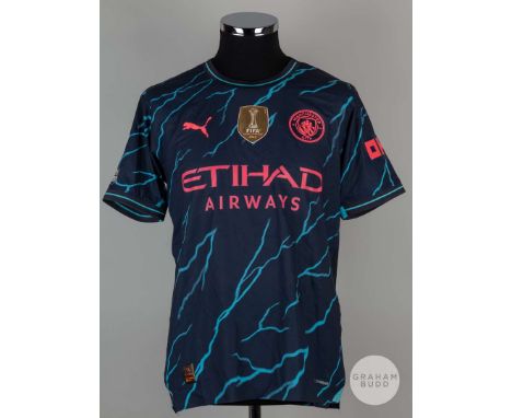 John Stones navy blue No.5 Manchester City short-sleeved shirt, 2023-24, Puma, S, with crew-neck collar and printed badge wit