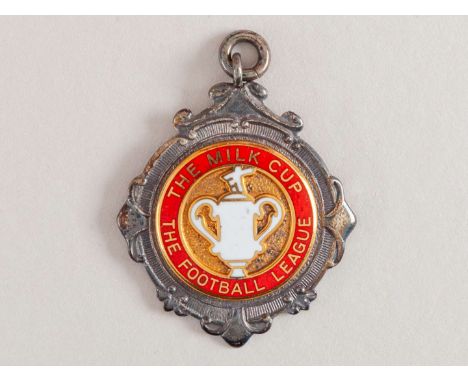 Mike Duxbury a silver and enamel Manchester United v. Liverpool Milk Cup (League Cup) runners-up medal, 1983, the obverse ins