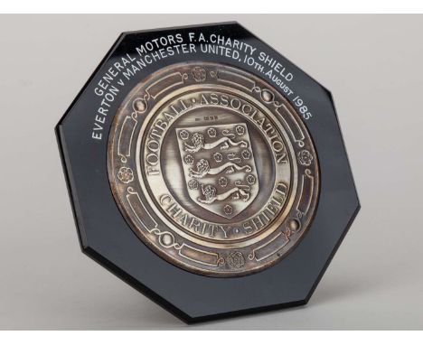 Mike Duxbury a silver-mounted and bakelite Manchester United v. Everton Charity Shield plaque, inscribed FOOTBALL ASSOCIATION