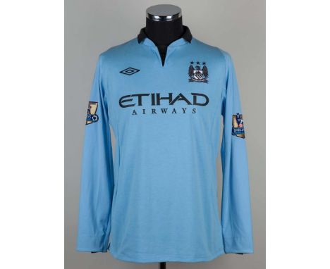 Mario Balotelli sky blue number 45 Manchester City long sleeved shirt 2012/12, Umbro size 42. V neck collar, embroidered badg